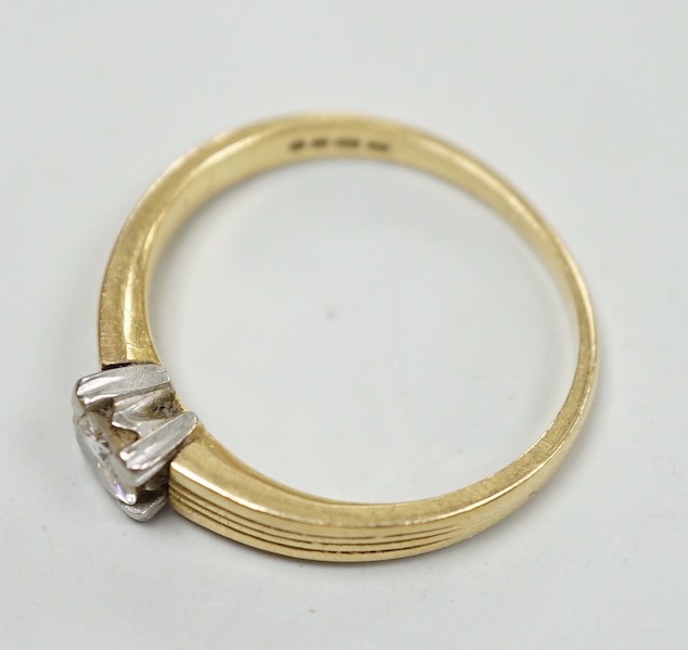 A 1960's 18ct gold and solitaire diamond ring, size M, gross weight 3.6 grams.
